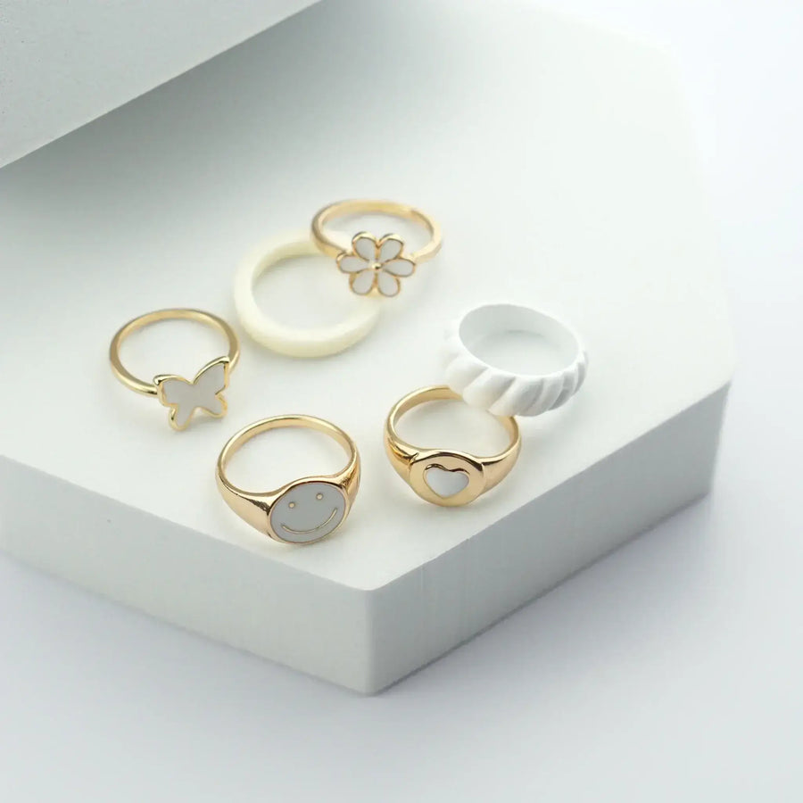 Set aus 18K Gold Ringen in Weiß - Eine elegante Auswahl an Ringen für einen luxuriösen Look.