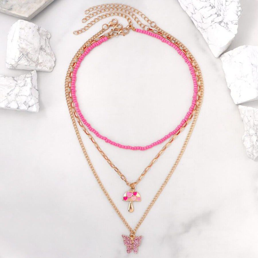 18k Gold Butterfly Multilayer Halskette in Rosa und Pink mit Pilzanhänger - Einzigartige Verspieltheit und Eleganz