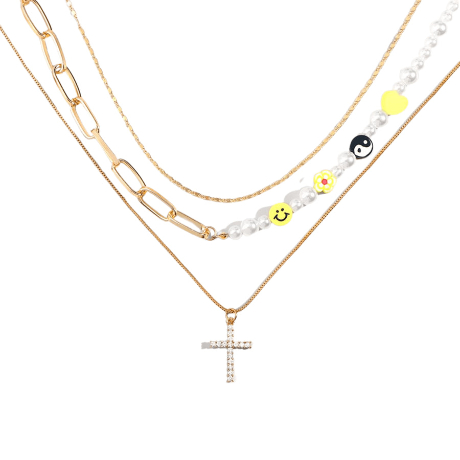 Zirkonia Kreuz Multilayer Halskette mit Peace- und Smily-Anhängern in 18K Gold für einen trendigen und fröhlichen Look